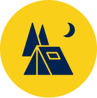 Camping icon with tent and trees.